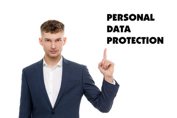 A businessman shows an inscription: PERSONAL DATA PROTECTION