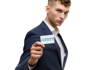 A businessman shows an inscription: AUDIT