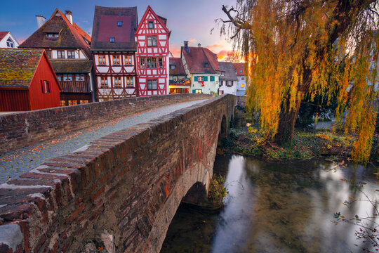 Ulm, Germany. Cityscape image of old town street of Ulm, Germany with traditional Bavarian architecture at autumn sunset.