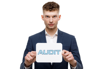 A businessman shows an inscription: AUDIT