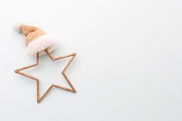 Christmas star, decor on pastel blue background.