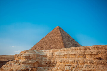Pyramid of Egypt against the sky. Ruin 
