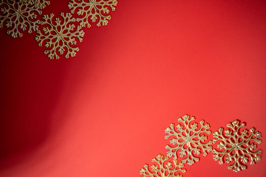 Red Background With Gold Flakes.