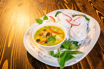 Thai style food, green curry with chicken, delicious vegetable Asian dinner