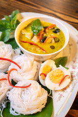 Thai style food, green curry with chicken, delicious vegetable Asian dinner