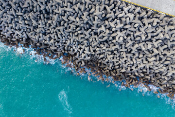 Top down view of the wave breaker over the sea