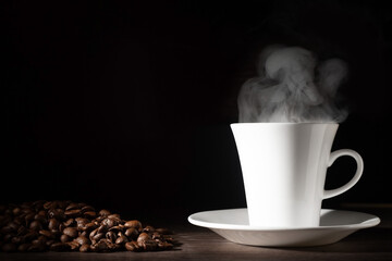 Cup of coffee on wooden table