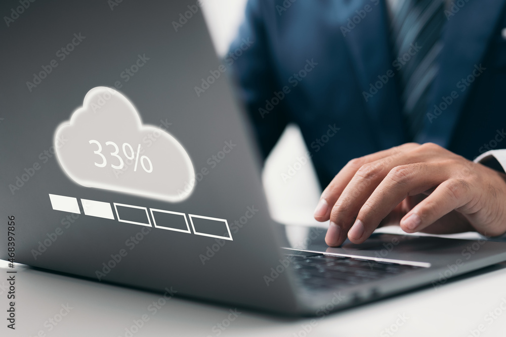 Poster Man doing cloud uploading or downloading on laptop computer at office