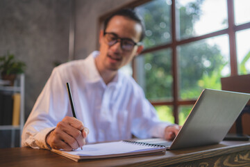 Asian business man person, freelance businessman working in co-working space or cafe