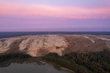 Aerial autumn fall sunrise view of Dead (Grey) Dunes in Curonian Spit, Lithuania