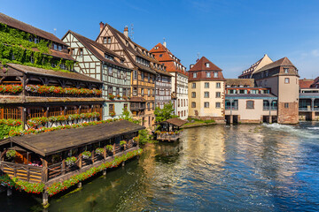 Panoramic view of half-timbered buildings lining the river Ill in the Petite France quarter on a morning..Strasbourg, France