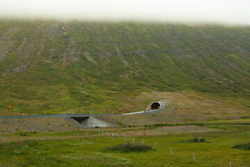 Road tunnel at the lake Hedinsfjardarvatn, Iceland, Europe
