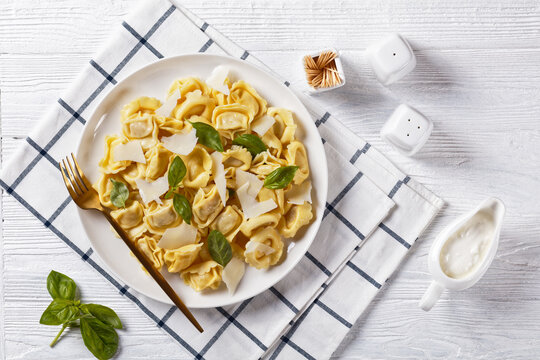 tortelloni with cheese filling on a plate