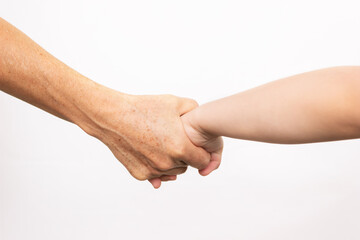 A caucasian adult woman holds a small child by the hand isolated on a white background. Agreement, arrangement, friendship, family. Different generations