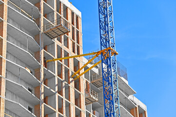 Crane and highrise construction site