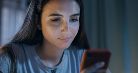 Young woman using her smartphone