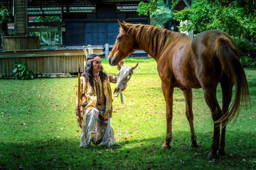 native Americans.Americans Indian man with horse .