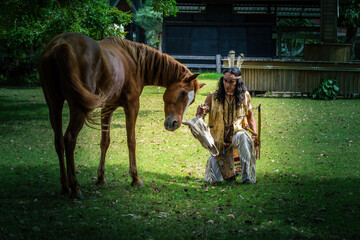 native Americans.Americans Indian man with horse .