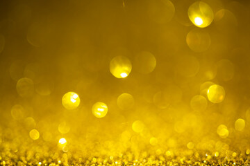 Golden bokeh background. Vintage glitter lights, christmas glowing effects backdrop photo