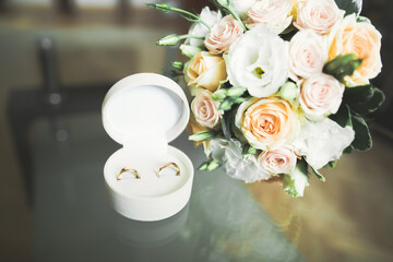 Two golden wedding rings isolated background concept