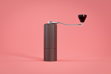 Front view of a coffee hand grinder in a pink studio setup - obrazy, fototapety, plakaty