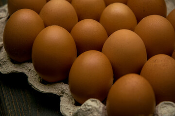 Egg background. Eggs in a carton box