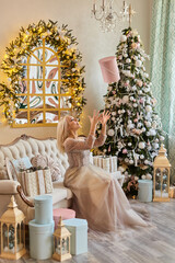 elegant beautiful blond woman with some Christmas presents
