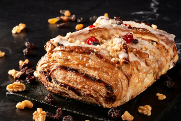apple strudel with walnuts, raisins and jellied cherries
