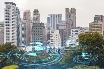 Technology hologram over panorama city view of Bangkok. The largest tech hub in Southeast Asia. The concept of developing coding and high-tech science. Double exposure.