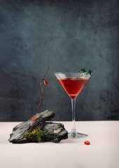 berry juice in a high glass, the concept of nature, naturalness and ecology, creative photography, selective focus