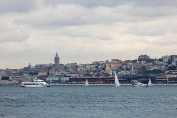 Fototapeta premium istanbul, turkey, october 29, 2021: the 2nd stage of the presidental international yacht race has been completed in istanbul's bosphorus strait
