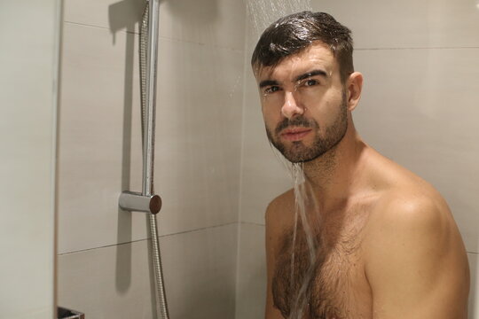 Seductive man in the shower 