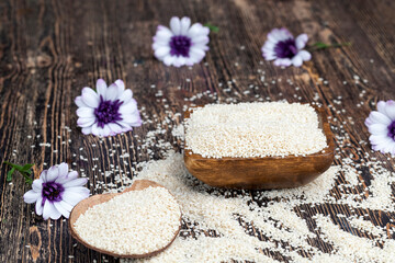 white sesame seeds on a wooden table