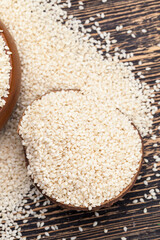 white sesame seeds on a wooden table