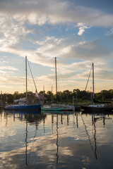Fototapeta na wymiar Sunrise over fishing boats in Charleston, SC.