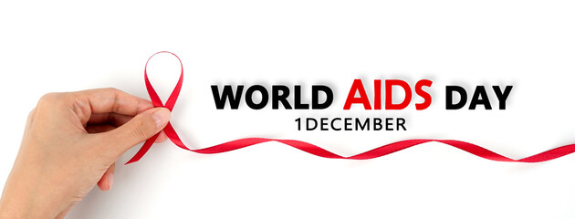 Aids Awareness Sign Red Ribbon. World Aids Day concept. Healthcare and medical concept, World Aids Day. red ribbon with hand.	