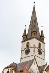 Fototapeta na wymiar The tower of the Evangelical Cathedral in Sibiu, Romania. Saint Mary Lutheran Cathedral.