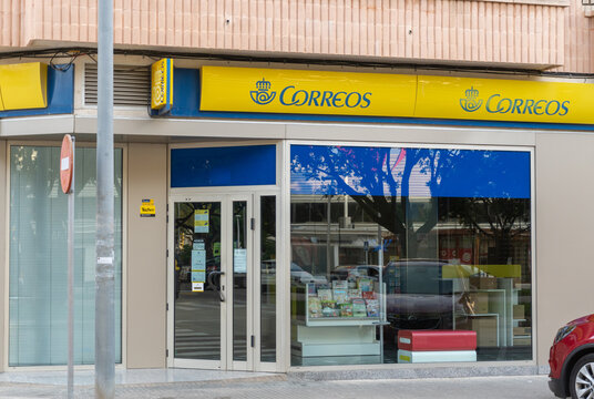 Correos office with large windows, on Gandia beach. Playa de Gandia, Valencia, Spain. 10/11/2021.