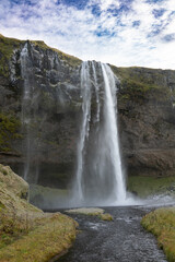Iceland waterfall Seljalandsfoss and icy way