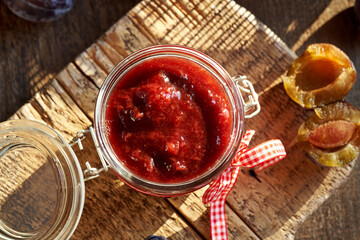 Klevela - a special kind of plum jam, with fresh plums in the background