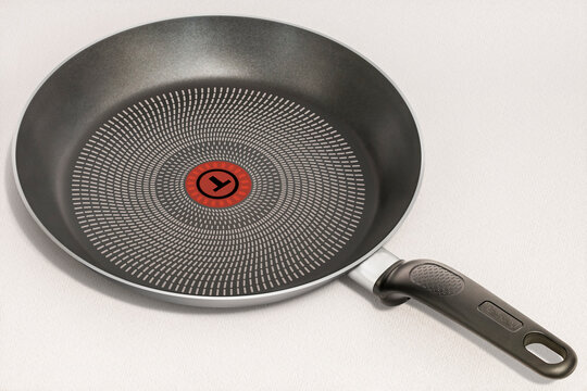 Studio Shot of Tefal Delicia Extra Non-Stick Frying Pan - 28cm Black Set on White Background