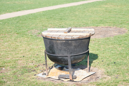 Large cauldron for cooking food over a fire