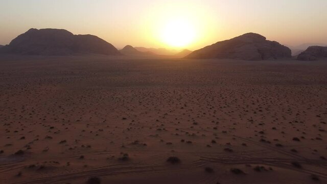 Aerial footage of a sunset in Wadi Rum, Jordan
