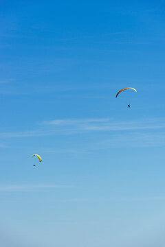 Paragliding Pilot Flying a Paraglider