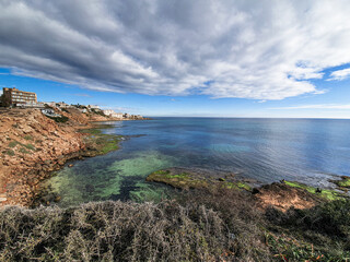 Fototapeta na wymiar Vega Baja del Segura - Las calas de Torrevieja paisajes junto al mar