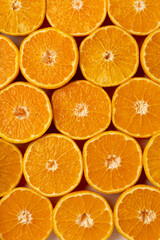 Fototapeta premium Juicy orange solid orange slices pattern