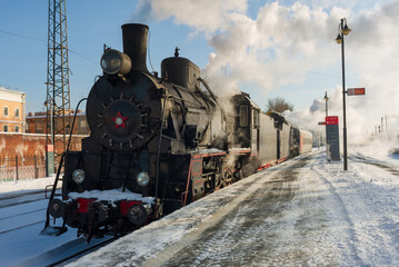 The locomotive arrived at the station.