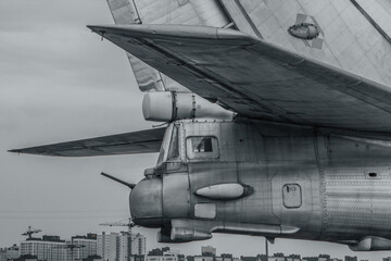 Old plane on the background of the city
