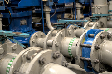Fototapeta na wymiar Industrial valves, pipes in modern offshore ship's engine room