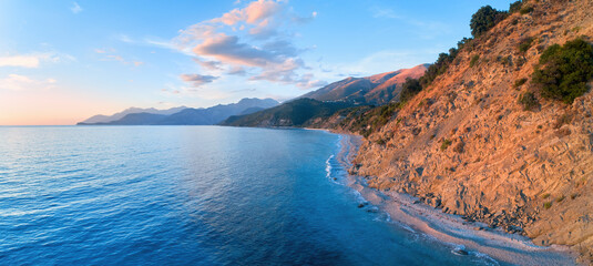 Aerial, panoramic view of a wild Mediterranean coast. Seascape, mountains and sea. Albania coast ...